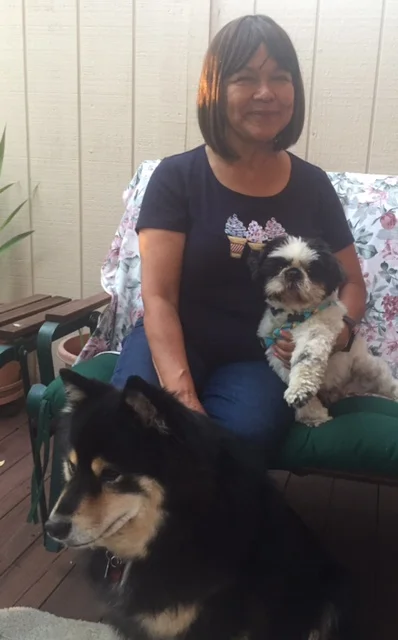 Cooper (on the lap) with his big sister Osa