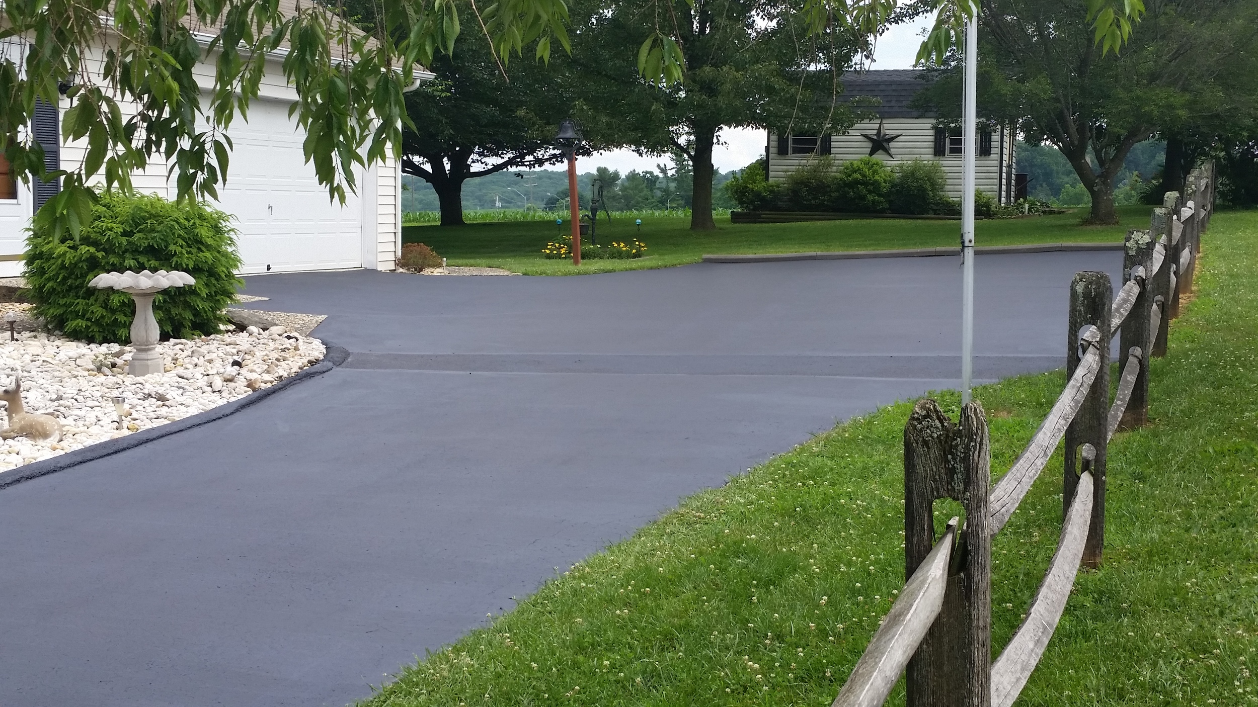 Asphalt repair and sealcoating