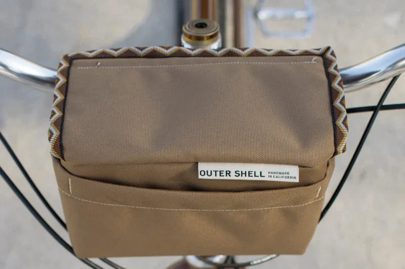 Outershell_Drawcord_Bag_on_Bike.webp