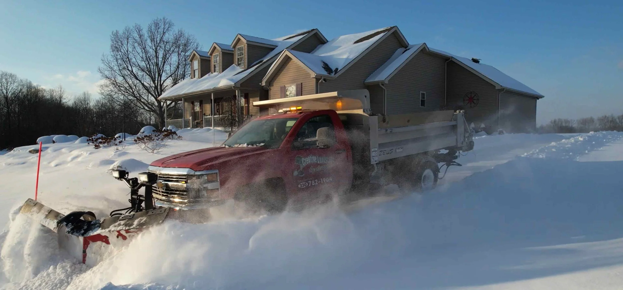 snow plowing driveway in Salem