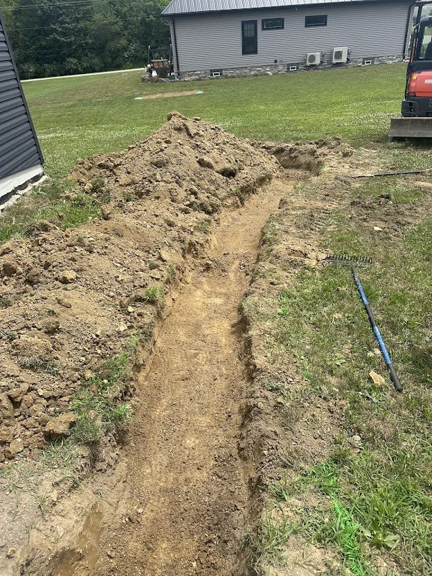 Digging out base for retaining wall