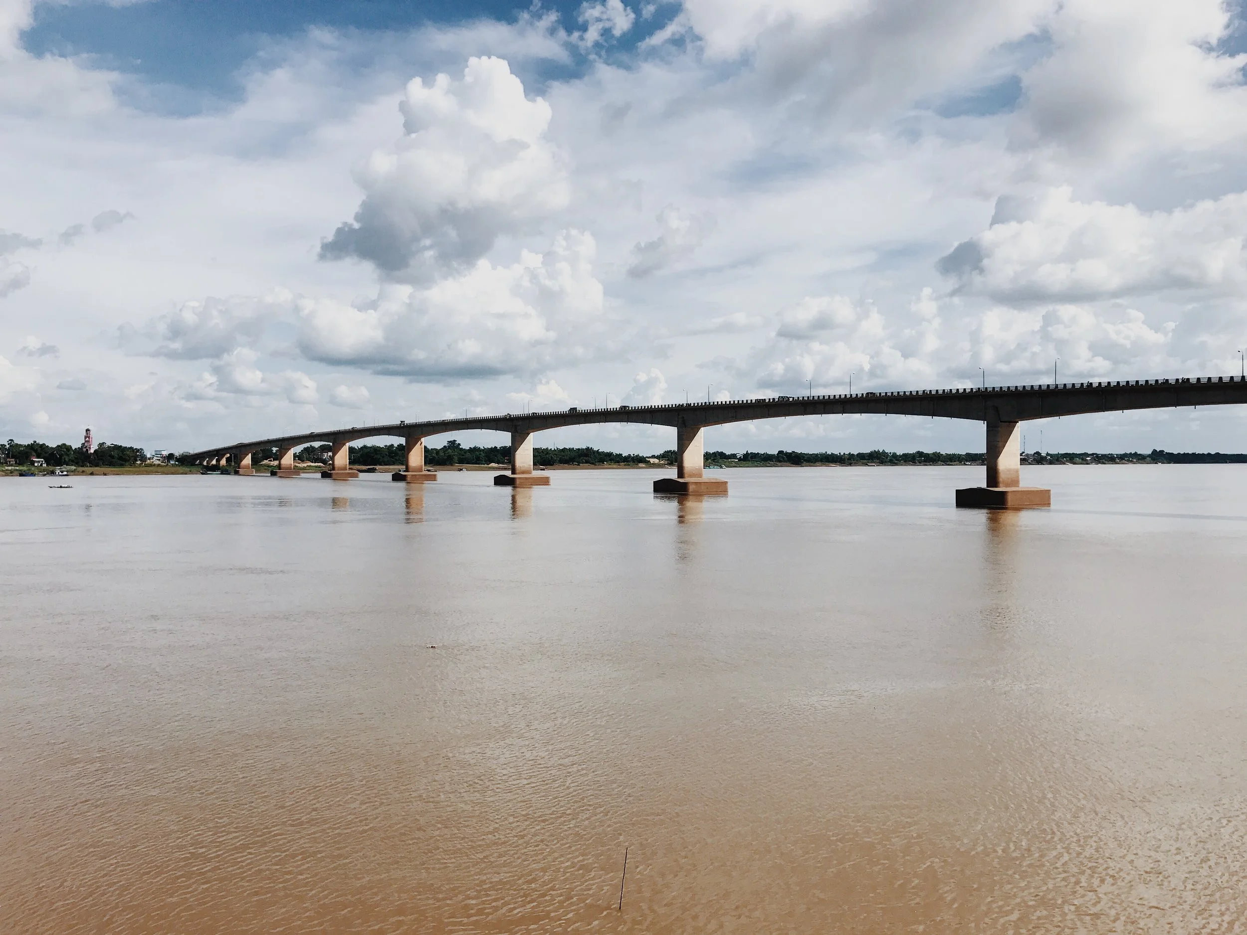 The view of the first bridge to be built over the Mekong River just a few steps from the Pizzeria