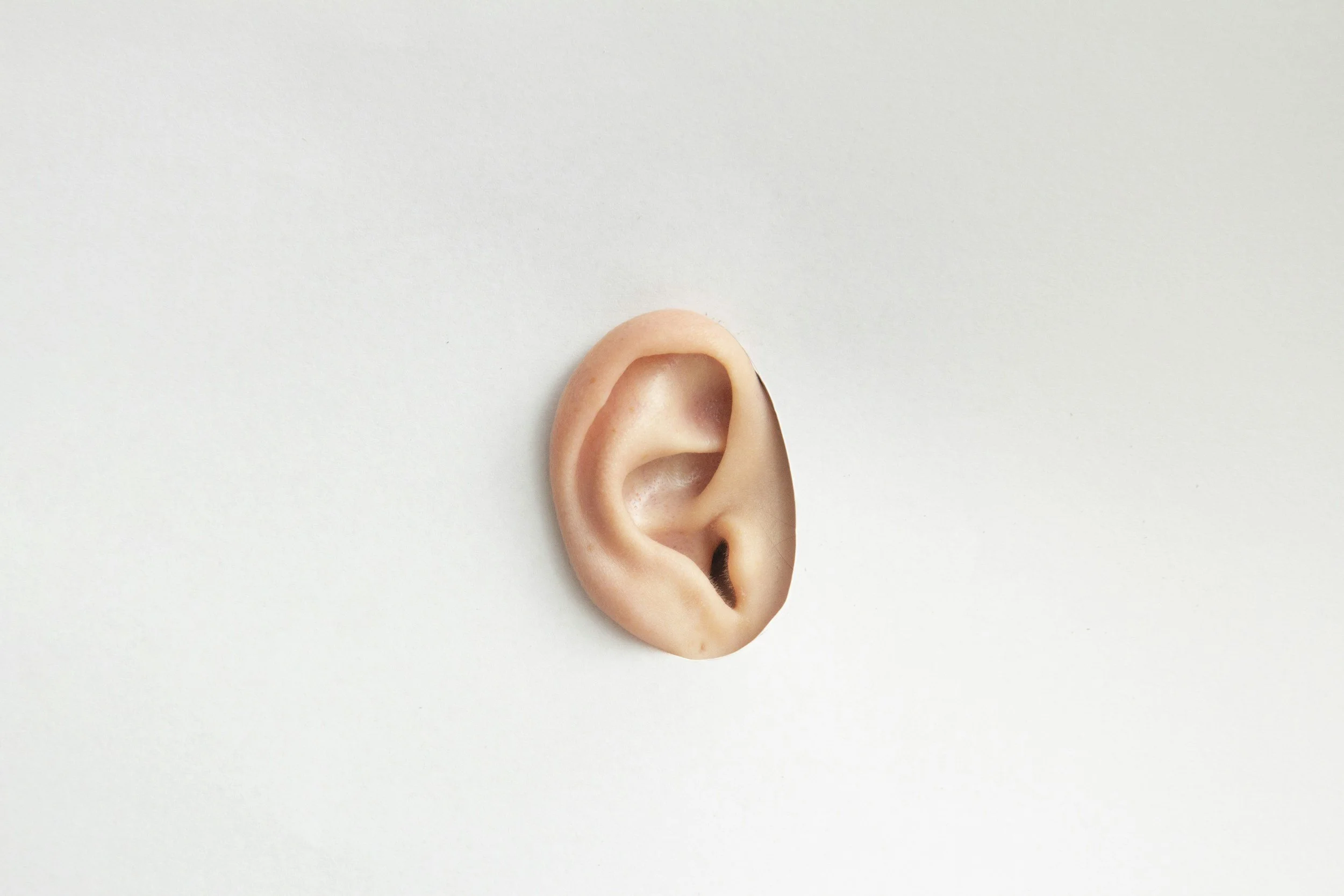 Ear through a cut-out