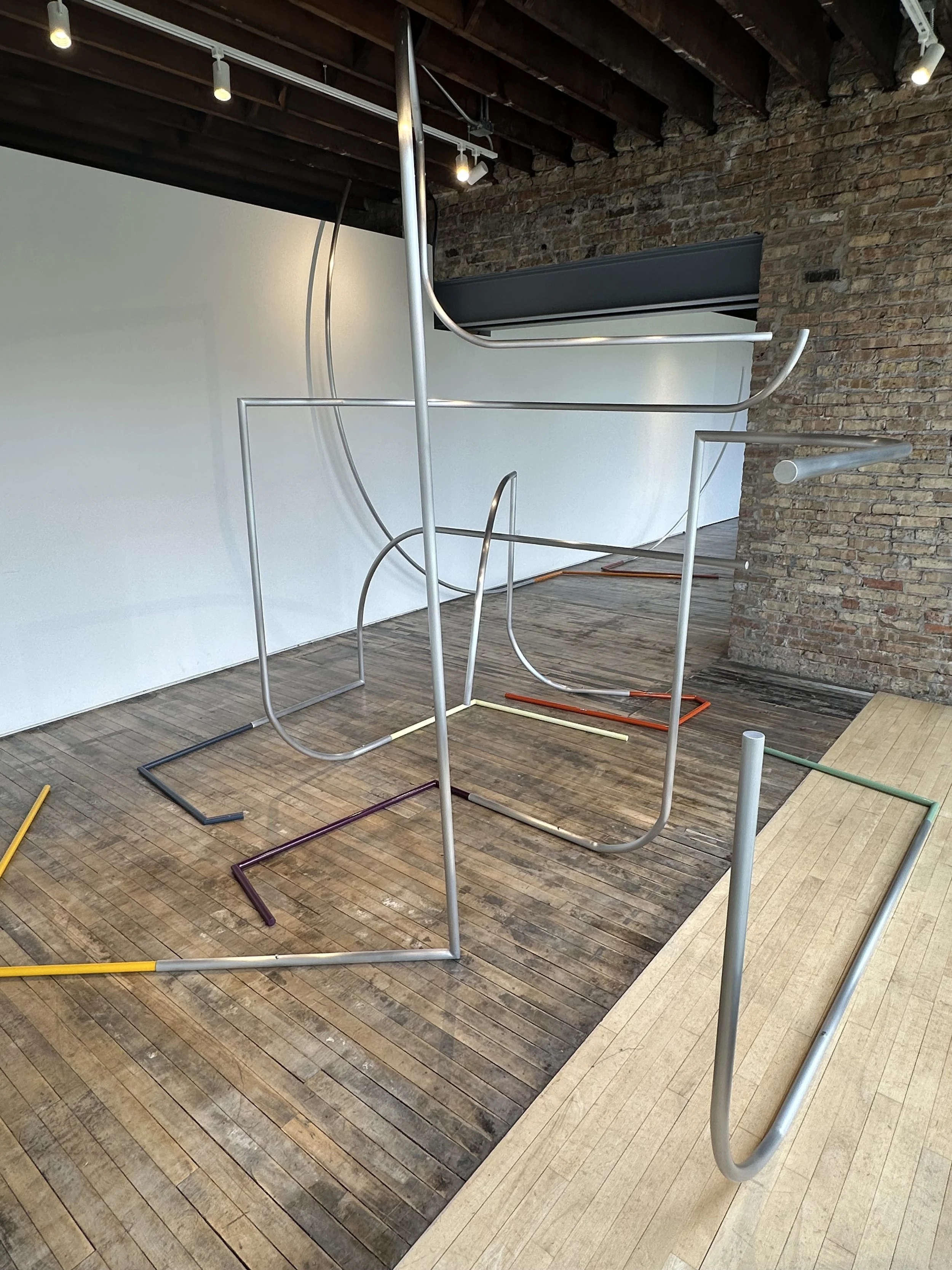  Ross Fiersten:  On Balance  (south gallery) | waxed aluminum and powder-coated steel  