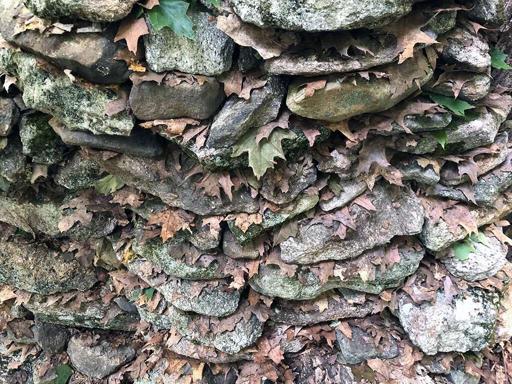 in the space ofGranite schist, clouds, ridge, breath.Hand-carved rocks of the same mineral composition as the distant ridges were embedded in the Hudson Highlands, Garrison. NY in view of a distant ridge.Text by the artist:How far the cloudsmove alo…