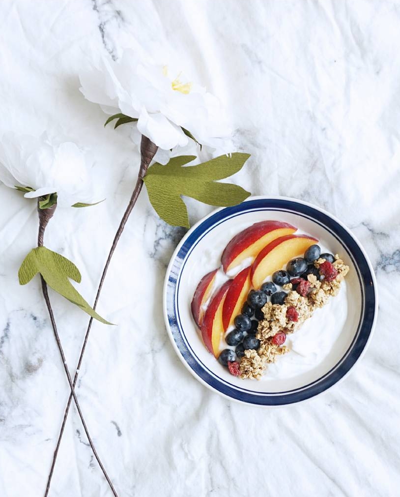 Plain yogurt with Kashi, blueberries and a nectarine
