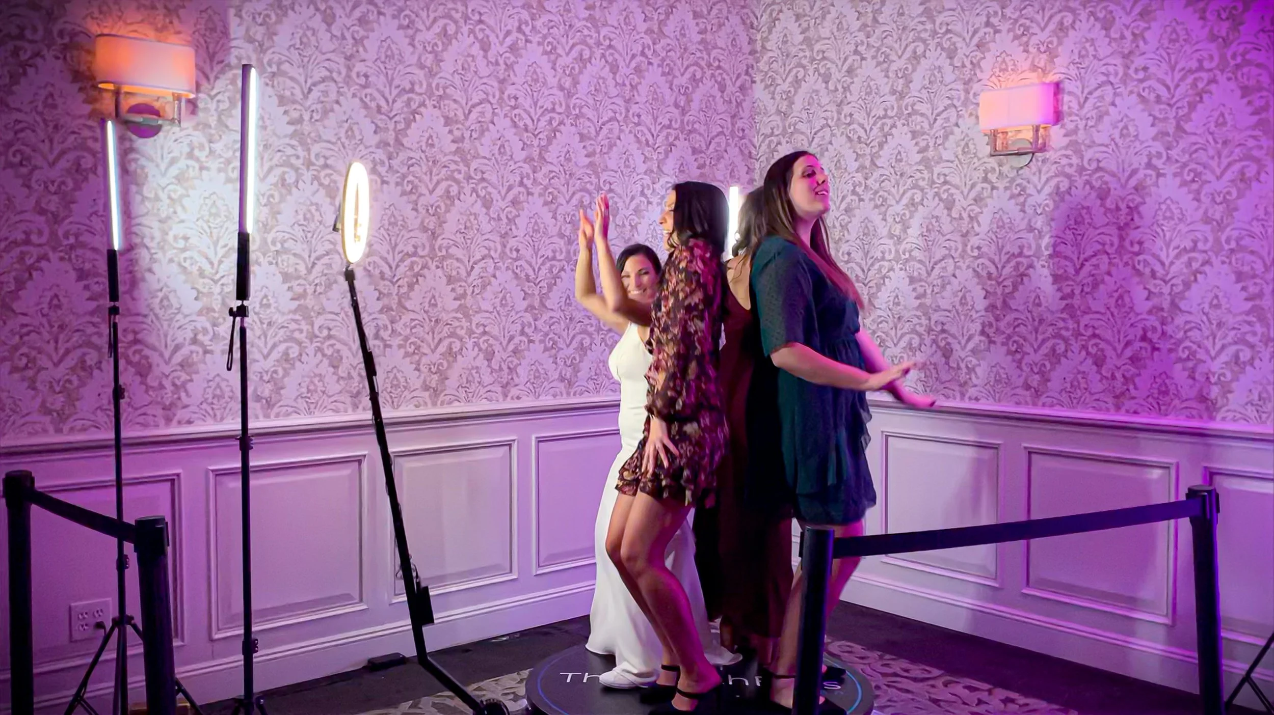Wedding guests dancing on a modern 360 Photo Booth