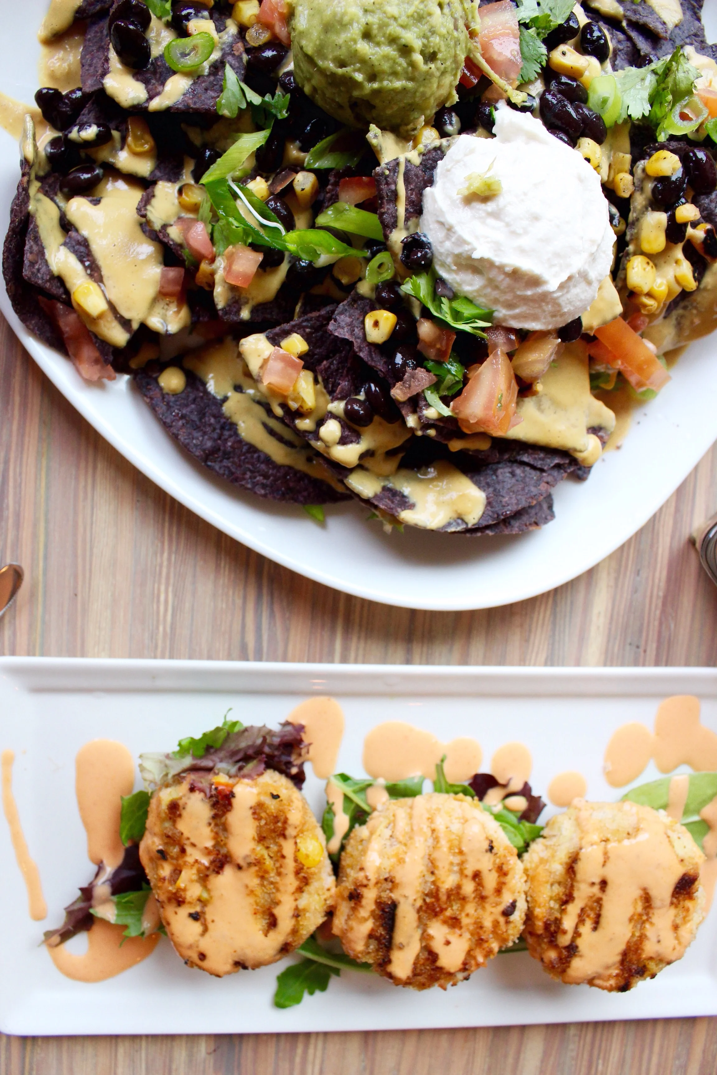 Seed nachos and artichoke cakes