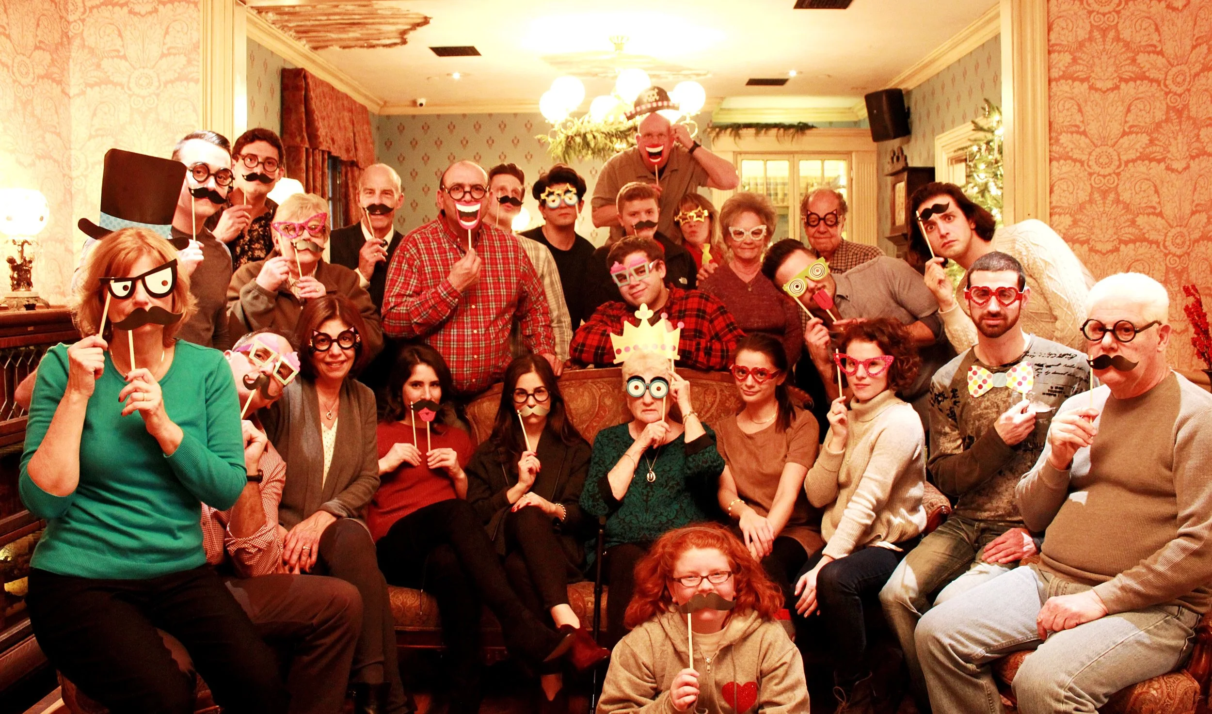 The fam. His aunt brought photo booth props!