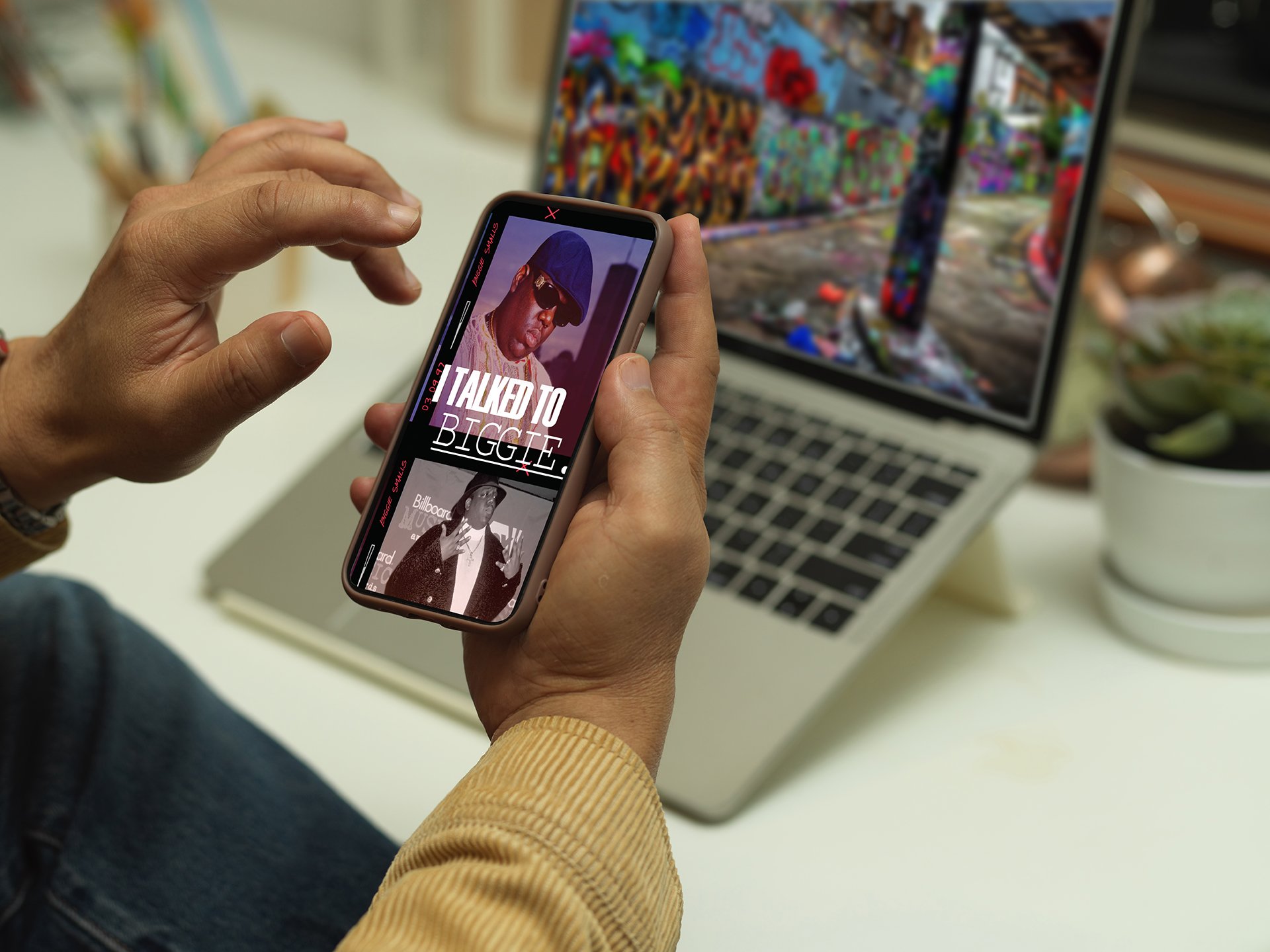 Male hand using smartphone while sitting at workspace, clipping 