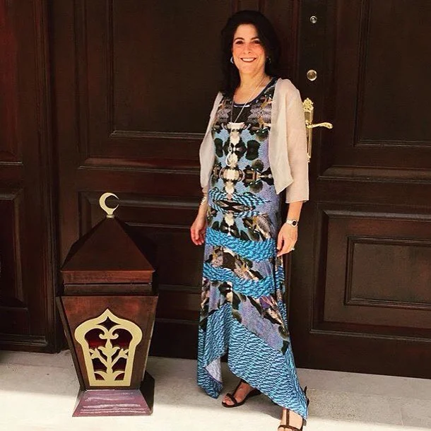 "Art on Fashion is a company that creates fashion pieces featuring artwork. Today I'm wearing a dress featuring the work of American artist Danny Augustine. It's called "Time" and began as an ink-based drawing that transforms to digital." U.S. Ambassador to Qatar - Dana Shell Smith