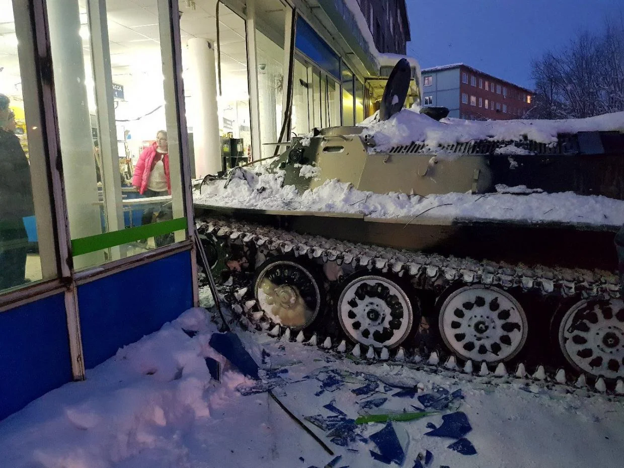 Drunk Dude Drives A Stolen Tank Into A Shop And Steals A Bottle Of Wine