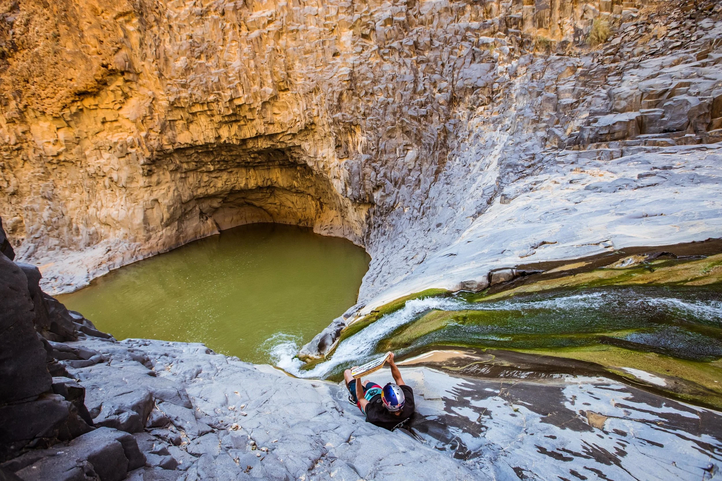 DUDE WAKE SKATES THROUGH A VOLCANIC VALLEY
