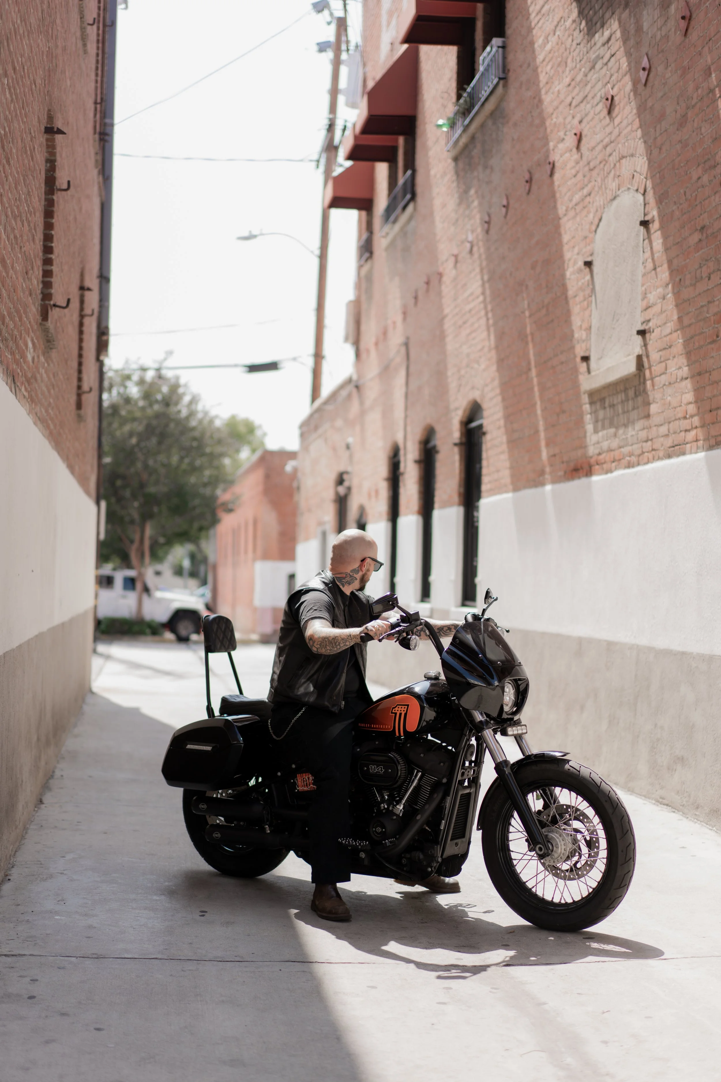 Tattooed guy on motorcycle