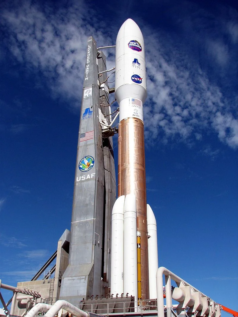 Launch of New Horizons. The Atlas V rocket on the launchpad (left) and lift off from Cape Canaveral. New Horizons ' launch was the fastest ever to date, at 16.26 km/s.