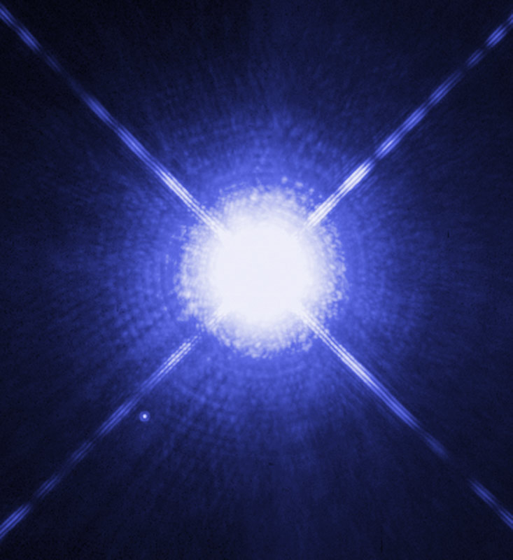 This Hubble Space Telescope image shows Sirius A, the brightest star in our nighttime sky, along with its faint, tiny stellar companion, Sirius B.