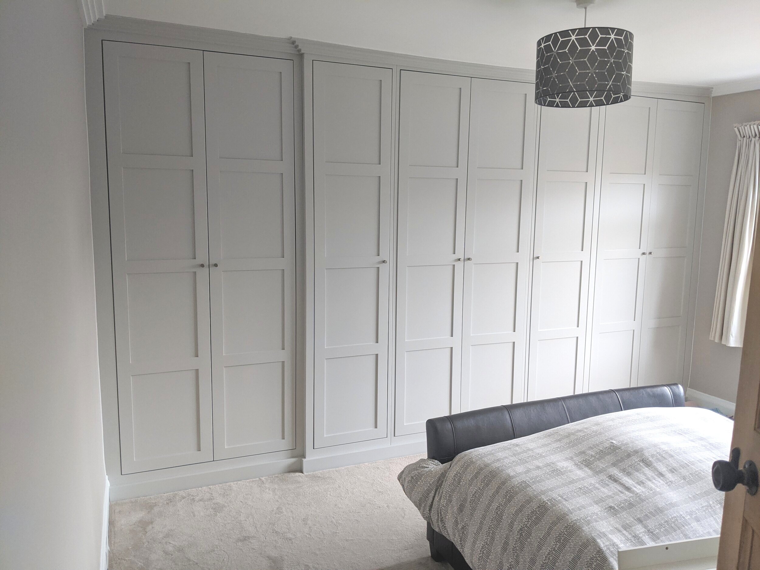 Panelled wall wardrobe Fitted wardrobe