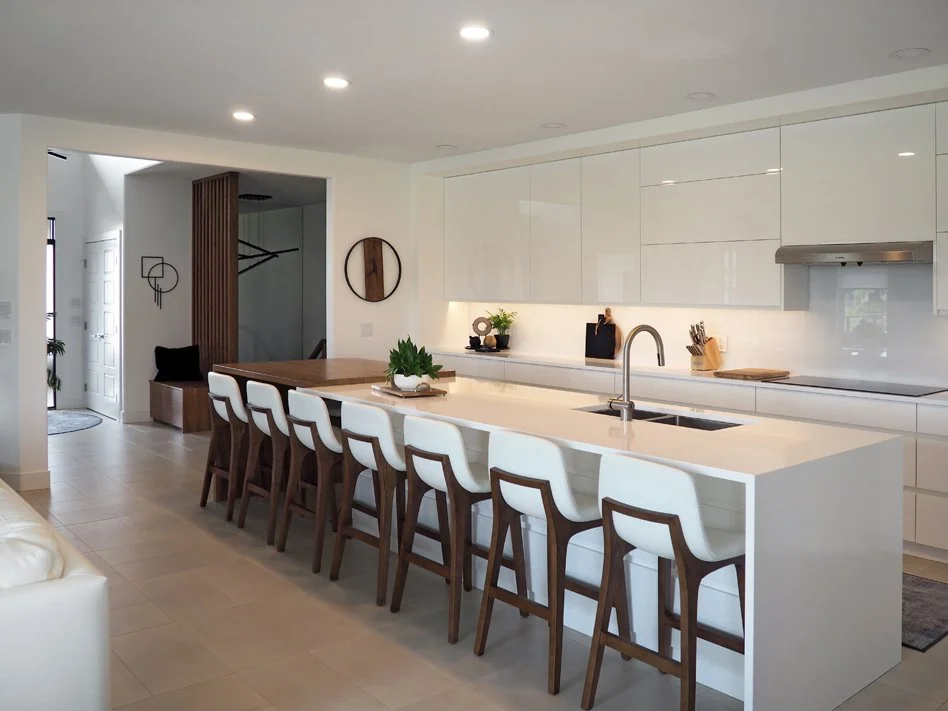 Gloss white and walnut kitchen