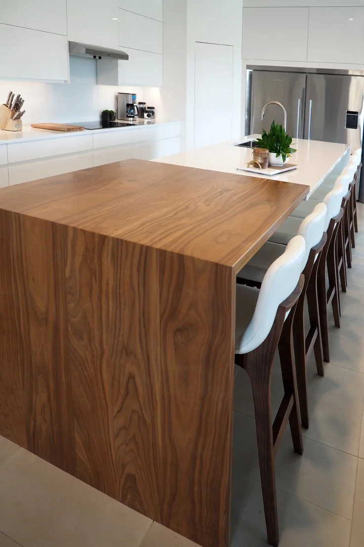 Gloss white and walnut kitchen