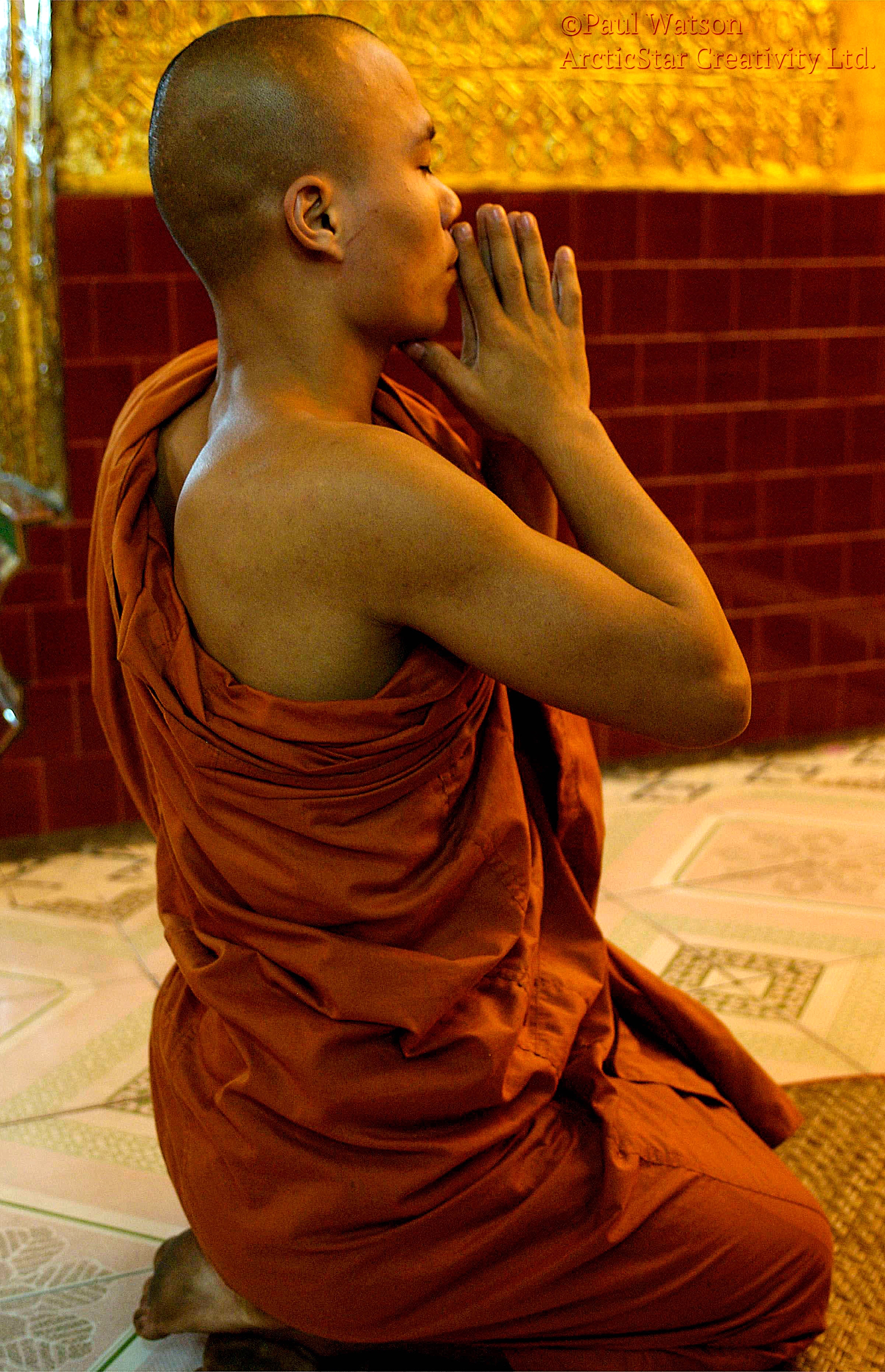 Kneeling to Pray in Mandalay