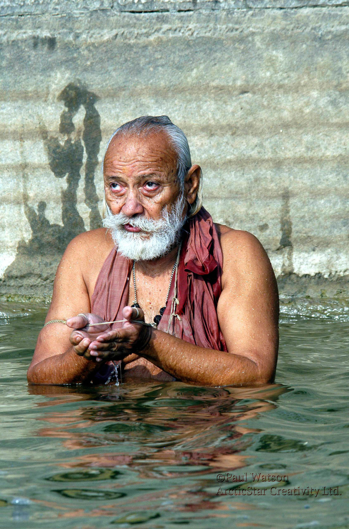 Praying in Mother Ganges