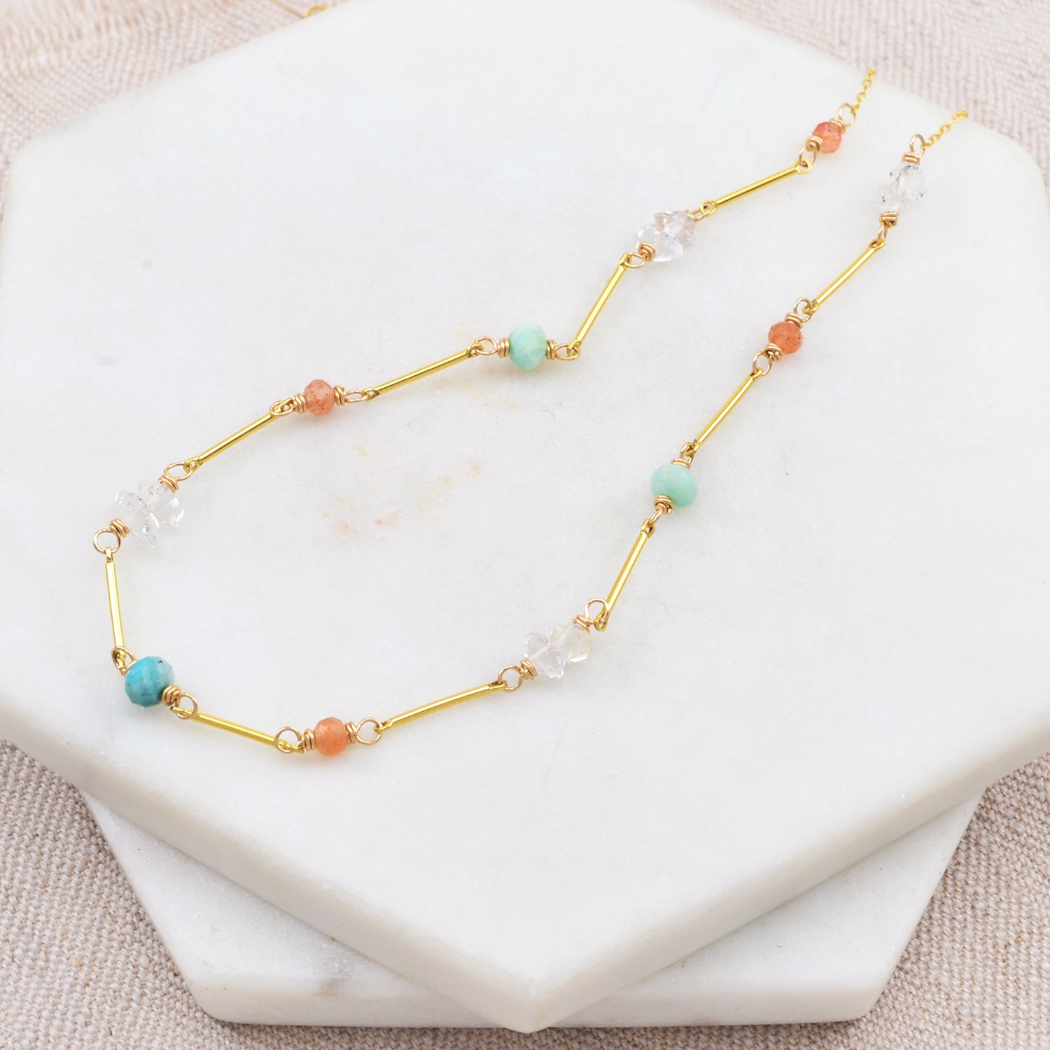 delicatamazonesunstinegoldnecklace.jpg