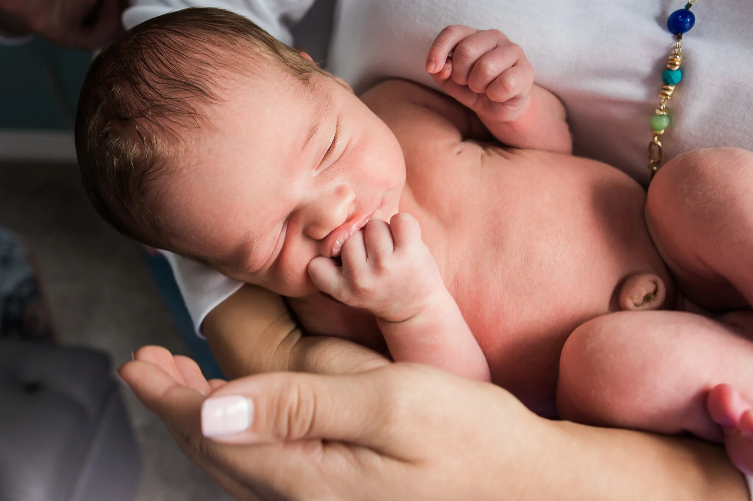 Charlotte lifestyle newborn mother and son close up