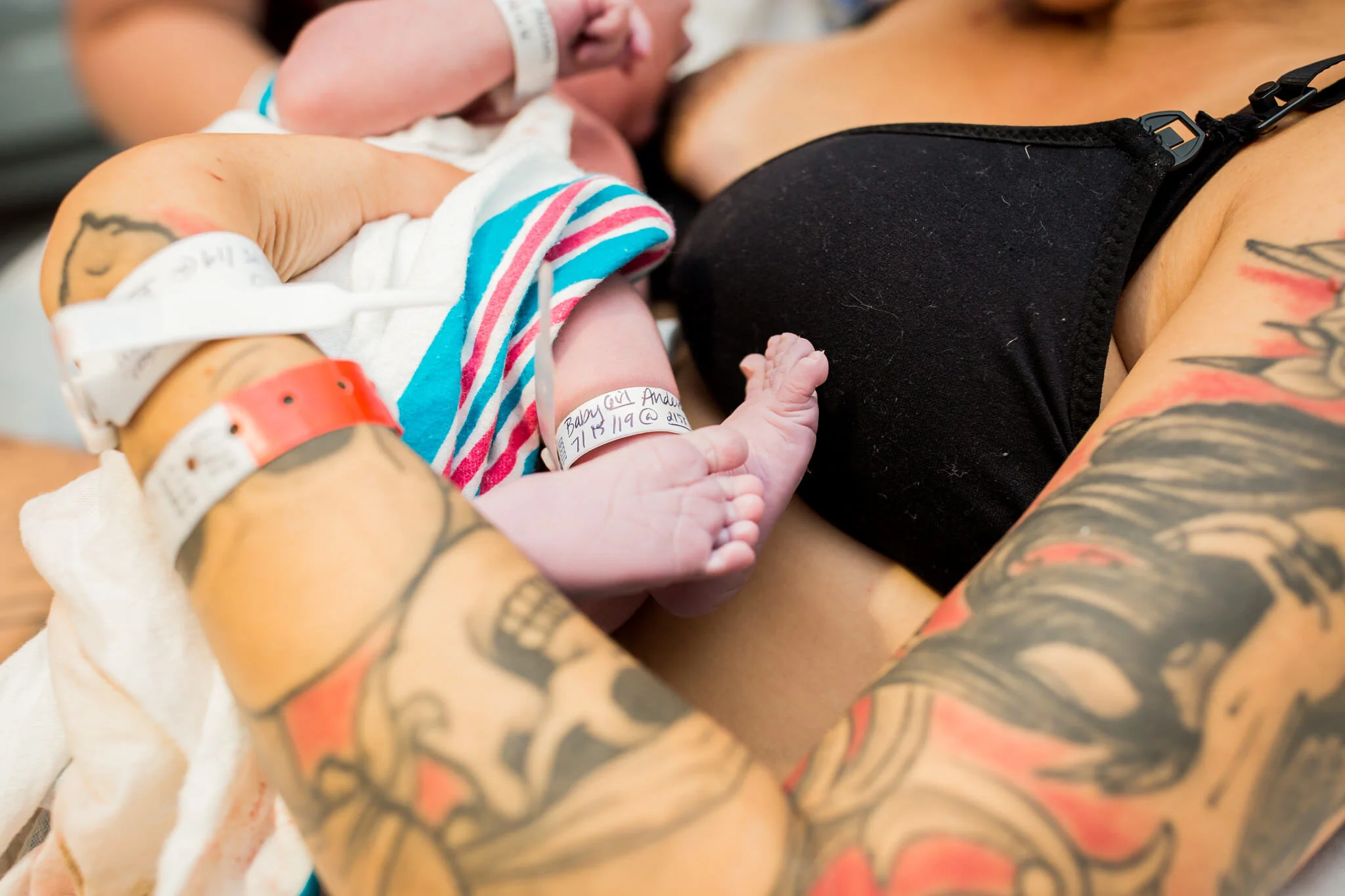 close up of newborn's foot after hospital birth