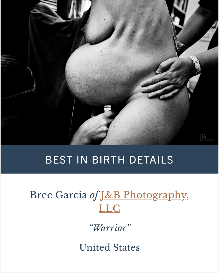 close up of pregnant belly during labor birth