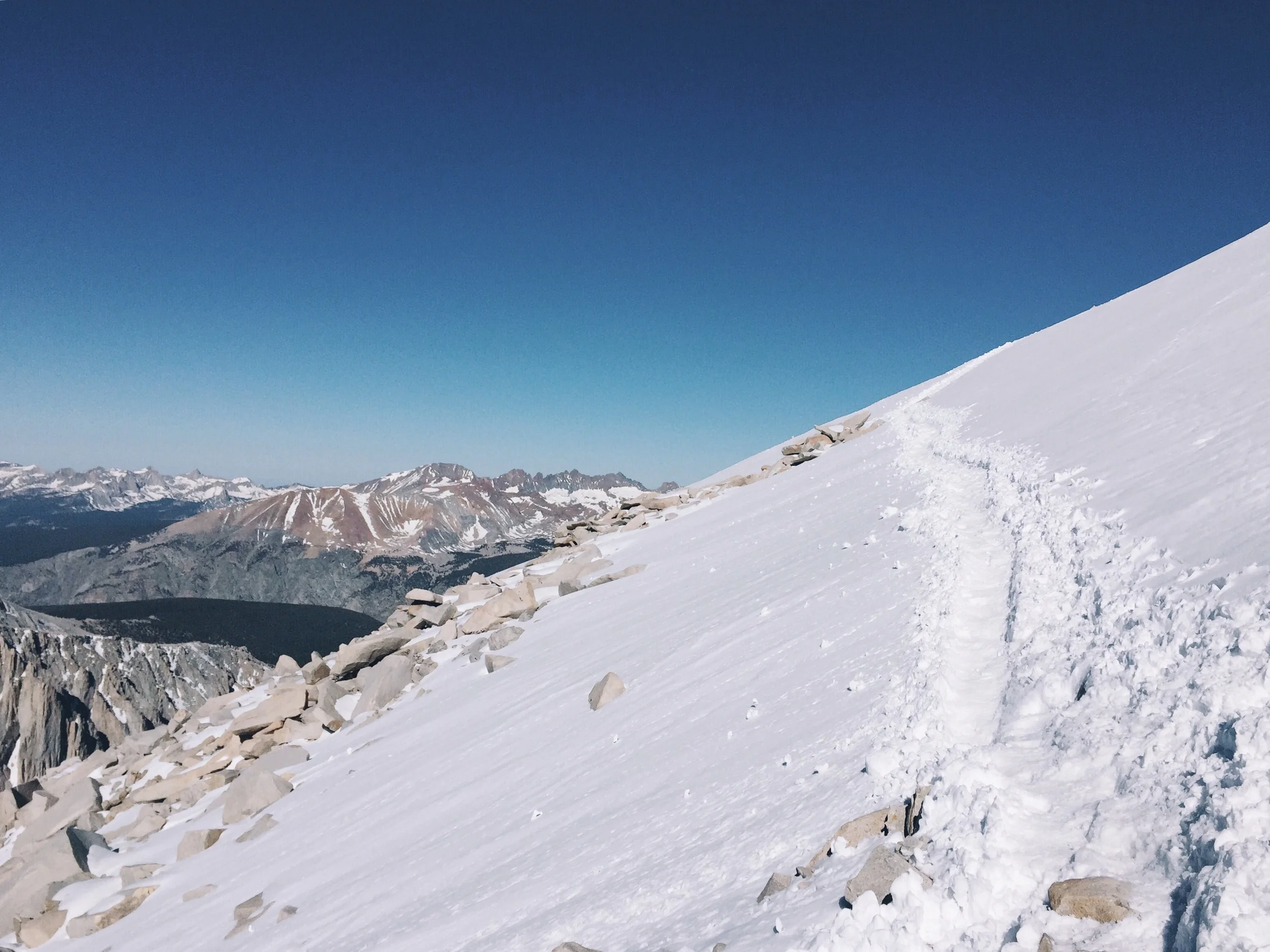 Climbing over the snowfield before reaching the summit. 