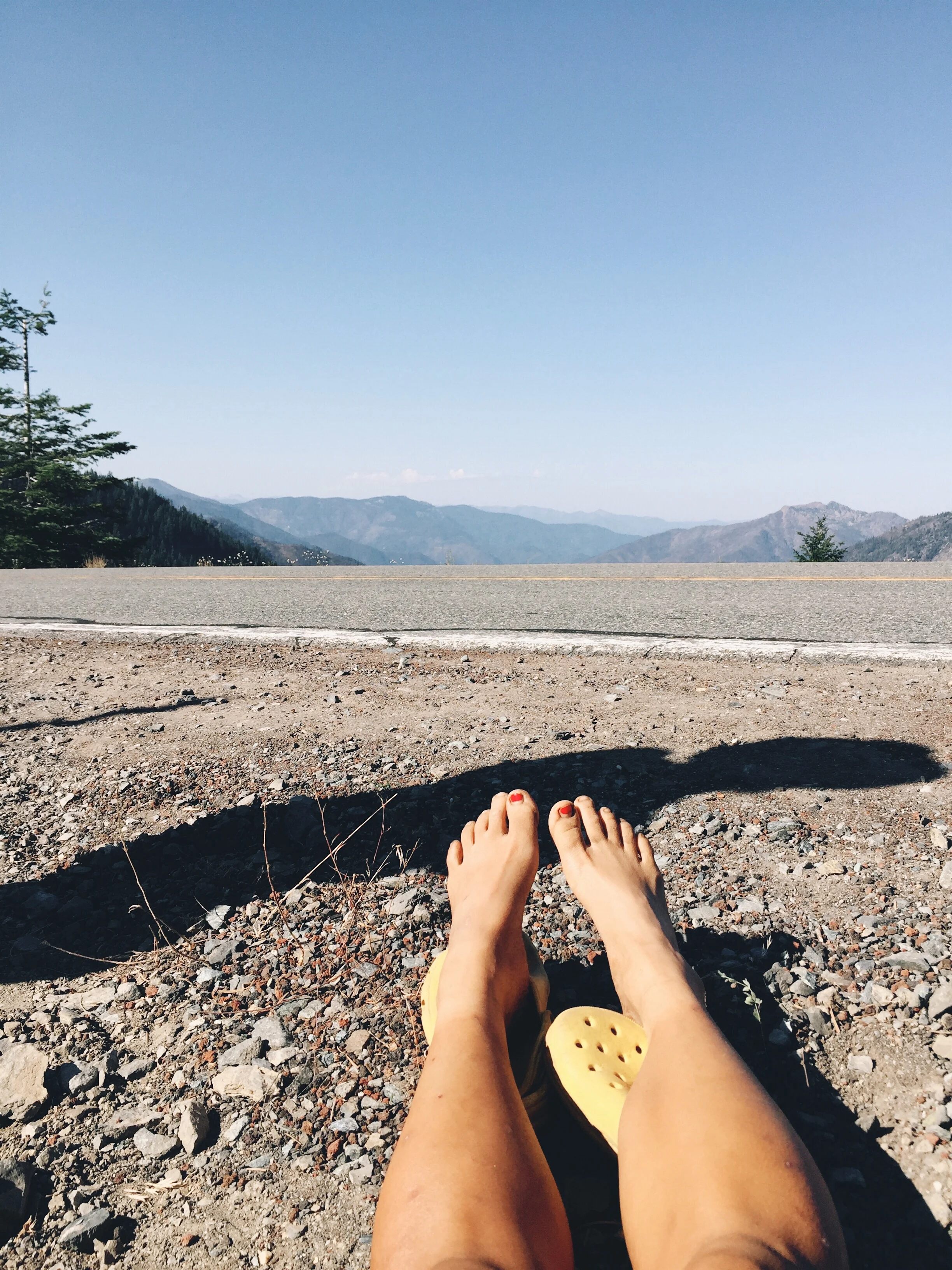 Waiting for a hitch on a lone highway.