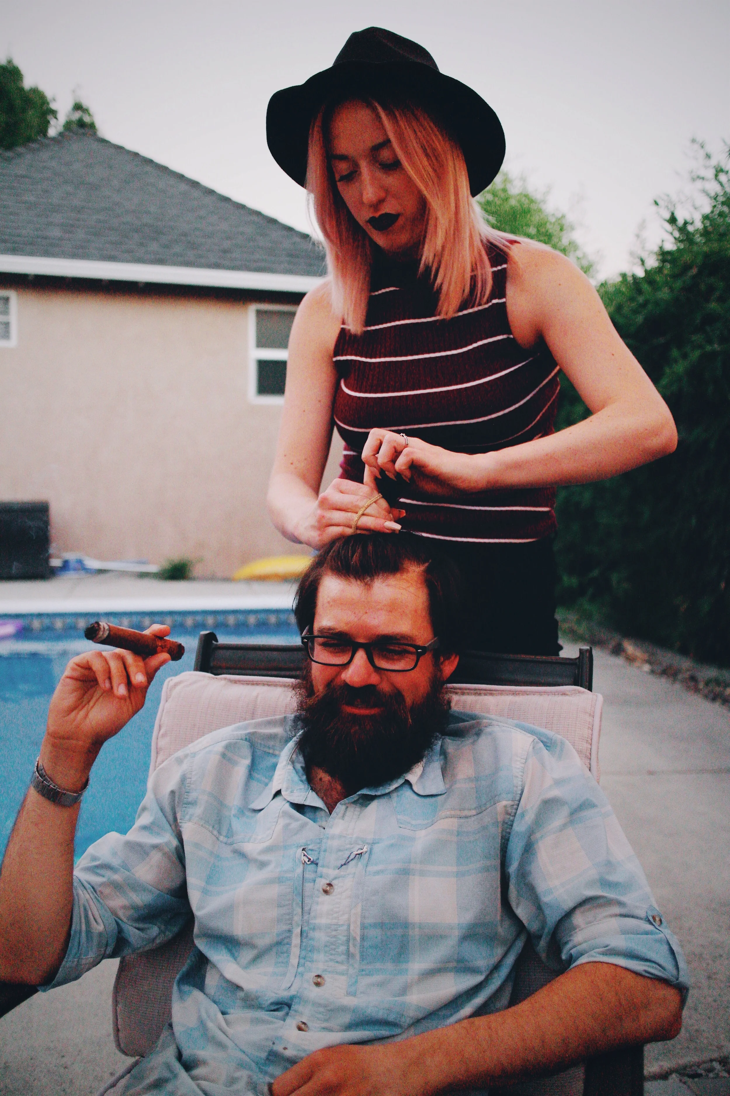 Bria tried giving gb a man bun. Didn't work. Hair too soft. 