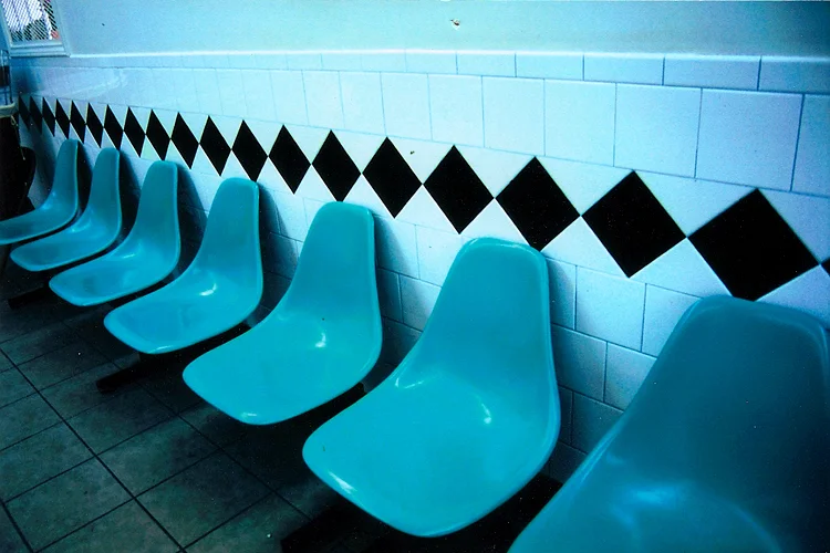 Abstract things like chairs at the laundromat. I discovered I really liked slide film for the vivid colors.