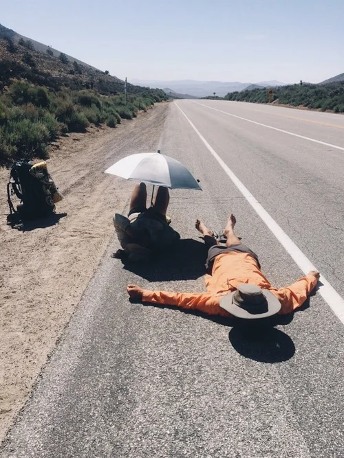 Laying on the hot, hot road, feeling helpless.