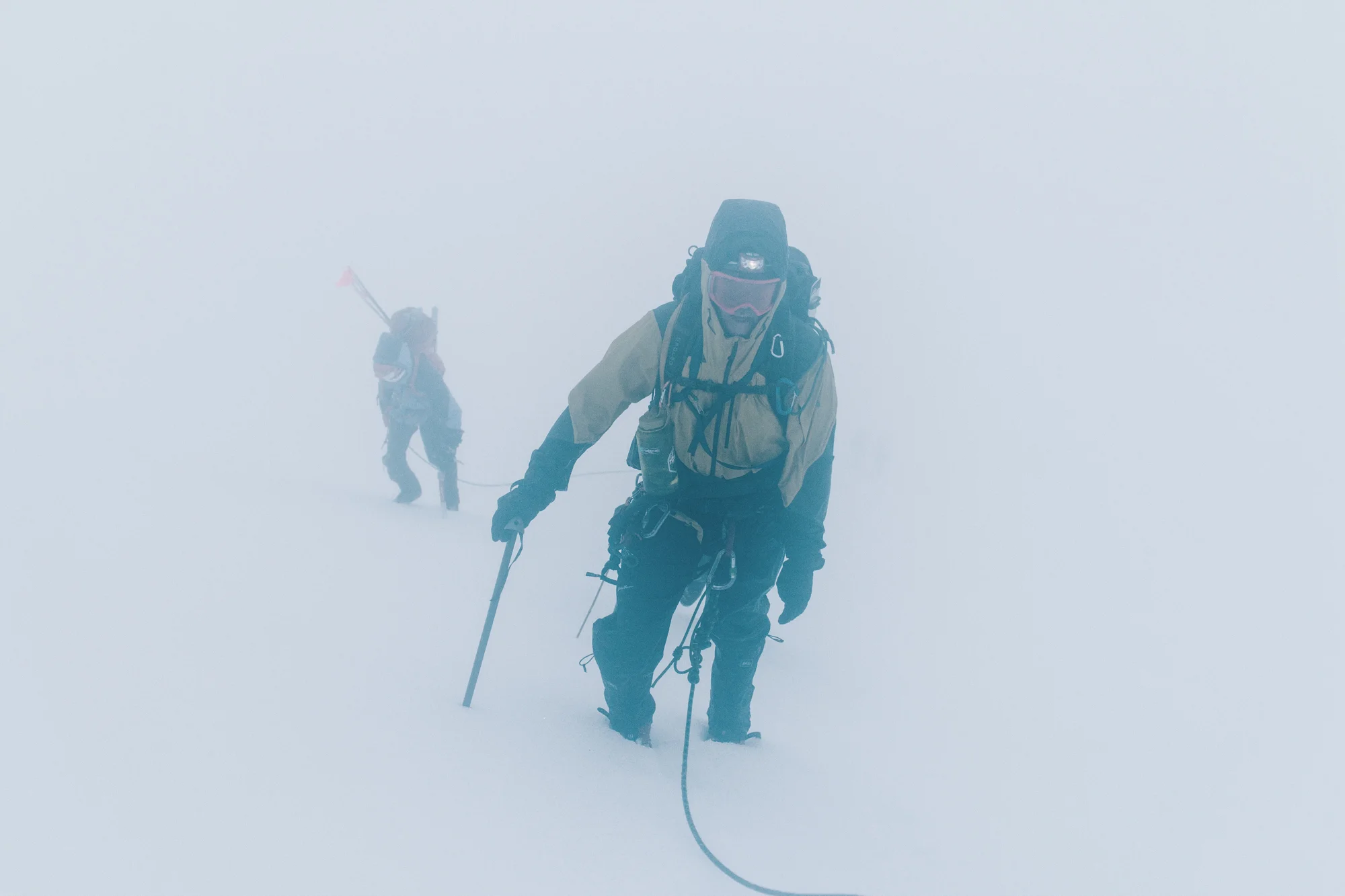 Then we climbed in the whiteout for several hours with freezing rain blowing at us all morning, completely soaked from head to toe.