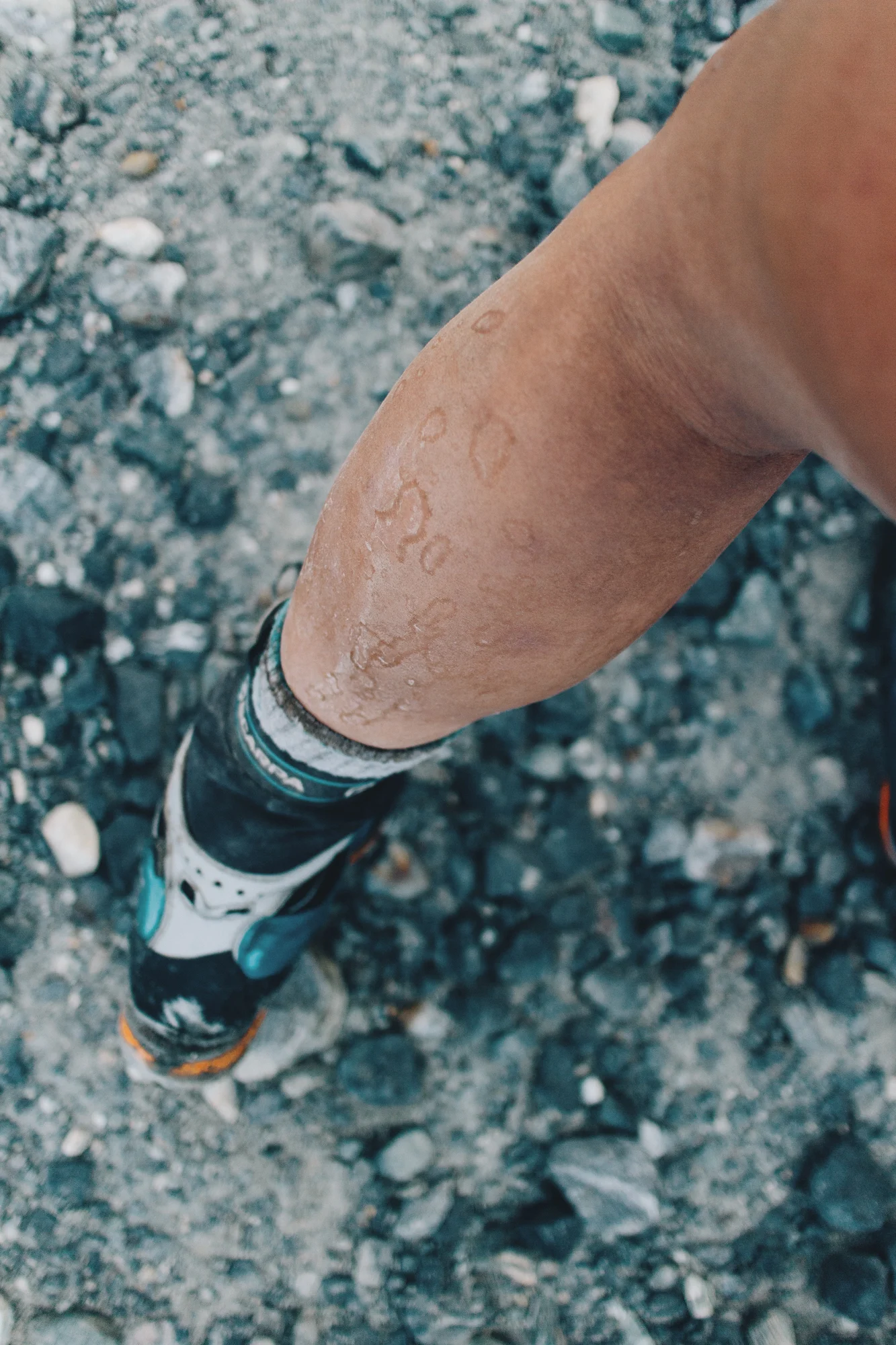 I reached the summit in shorts and so much dirt, silt and snow were glued to my legs.