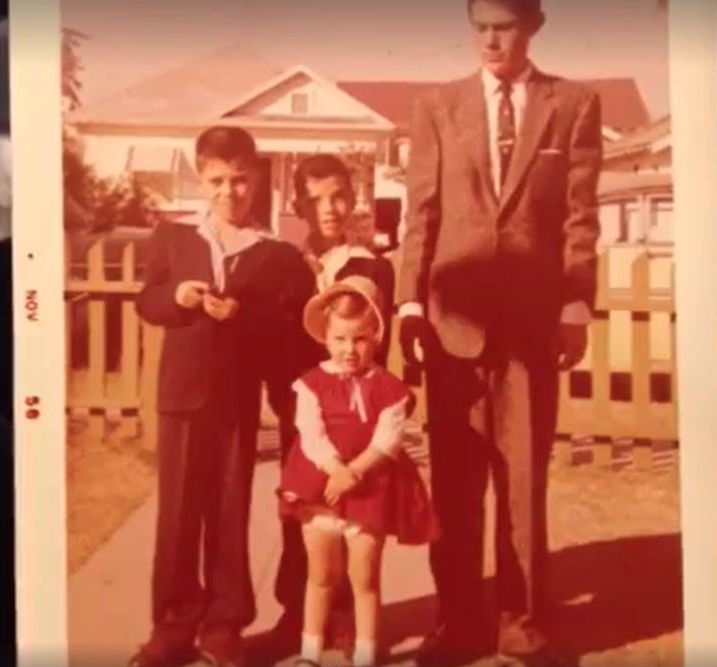My dad is that little one in the middle with the cool guy eyebrow thing going on