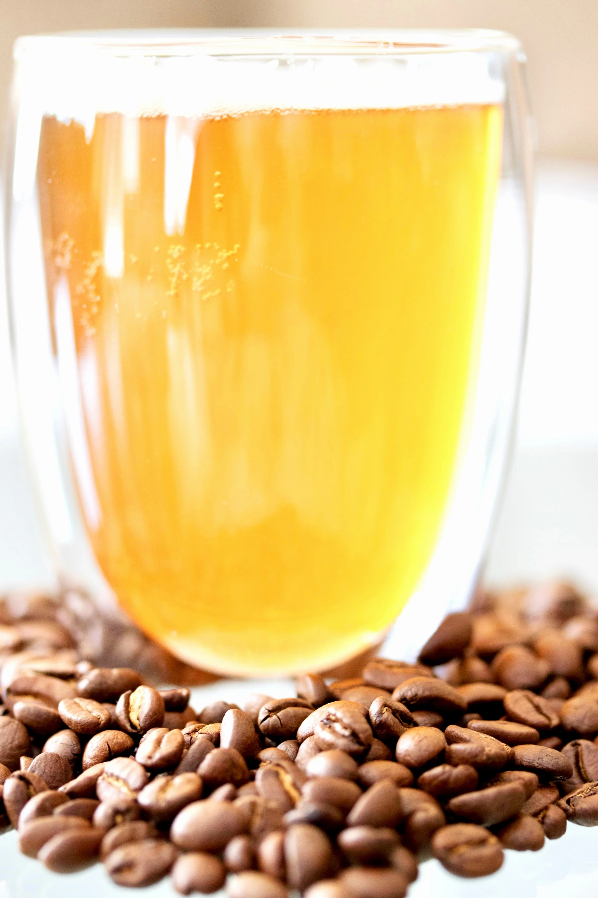 INGREDIENTS: Organic Raw Kombucha (Purified Water, Organic Green Tea, Organic Black Tea, Organic Evaporated Cane Juice, Organic Live Kombucha Culture), organic coffee.