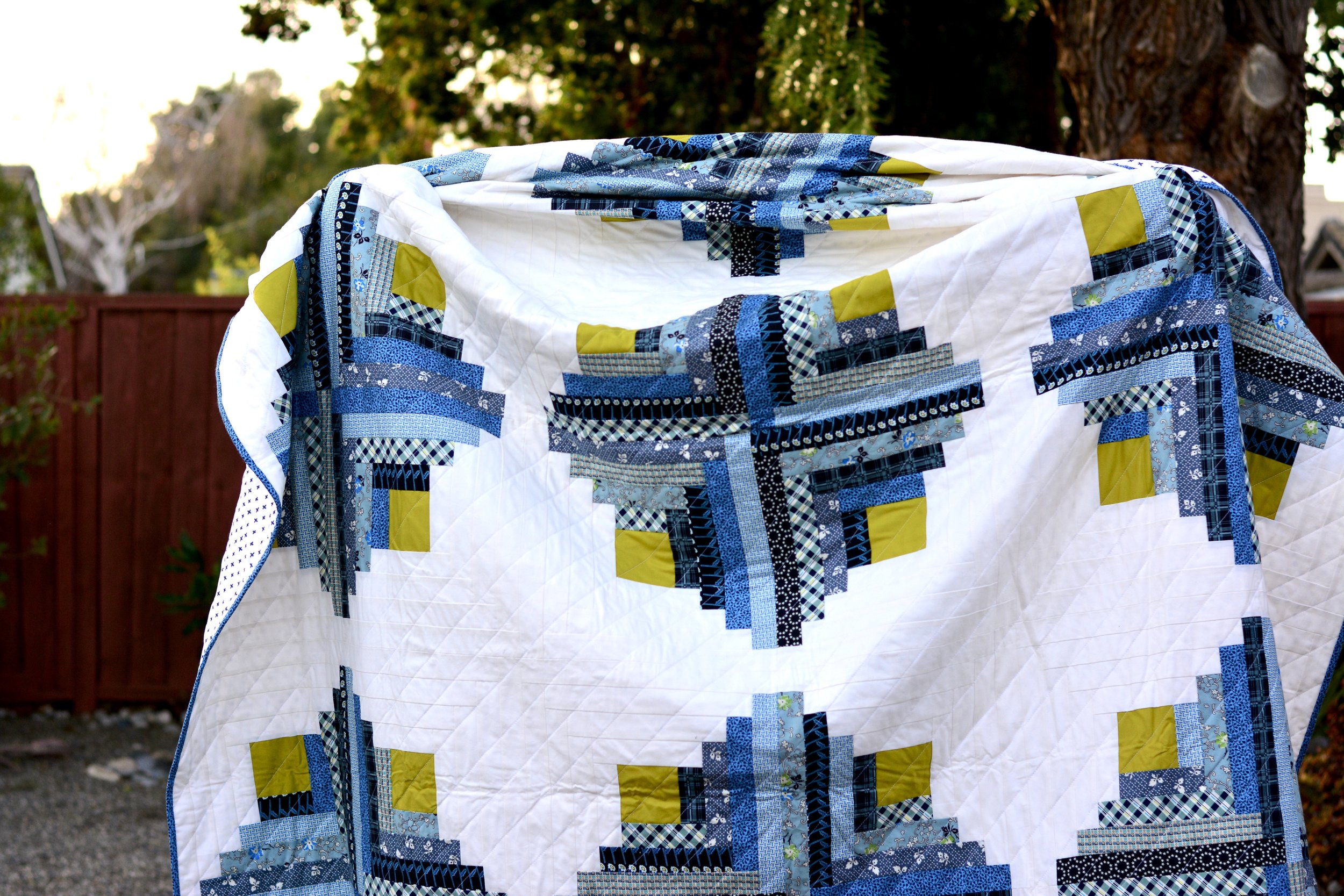 BLUE AND GREEN LOG CABIN QUILT 