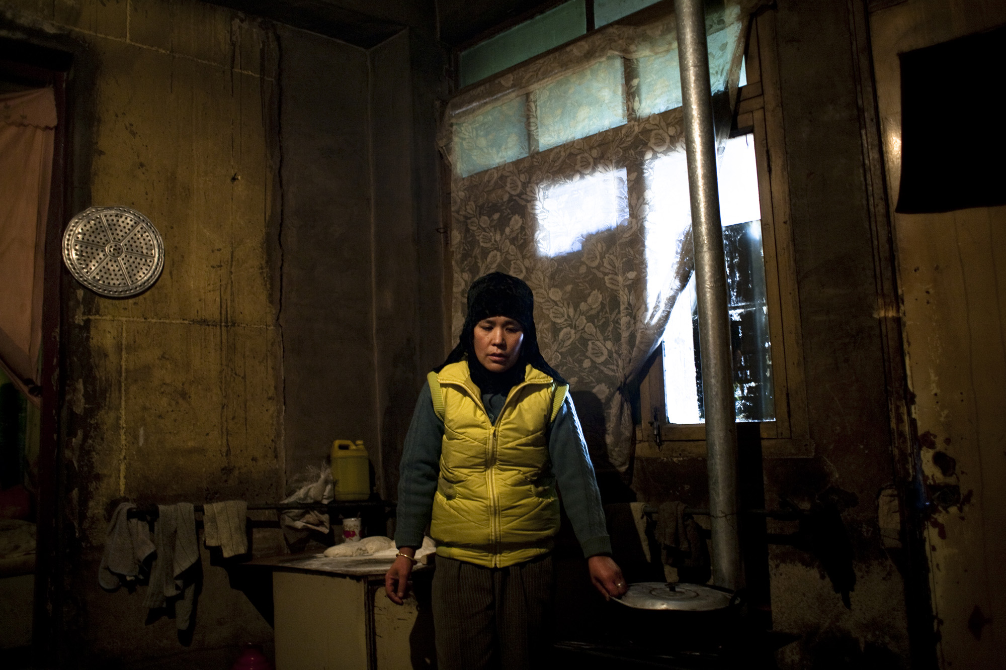 Ma Lan Hu in her kitchen.