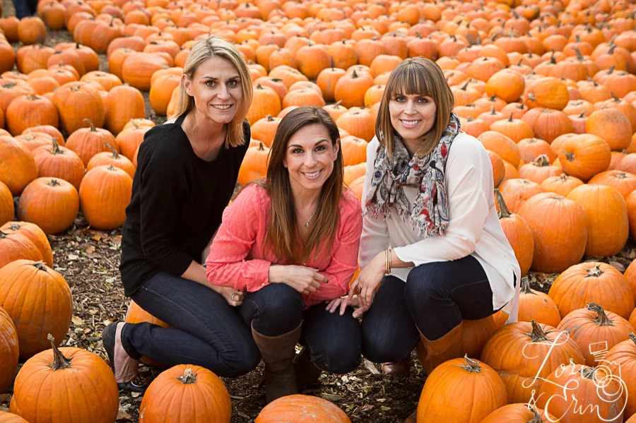 3 women and pumpkins