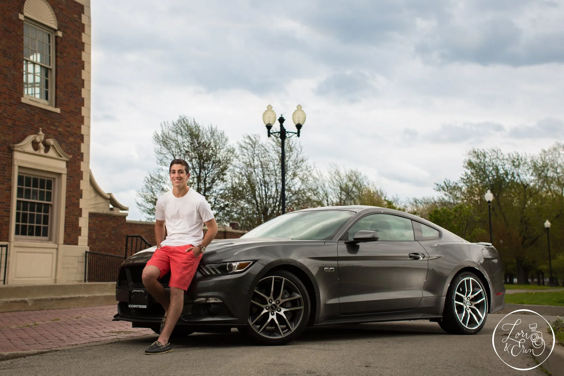 high_school_senior_boy_with_mustang.jpg