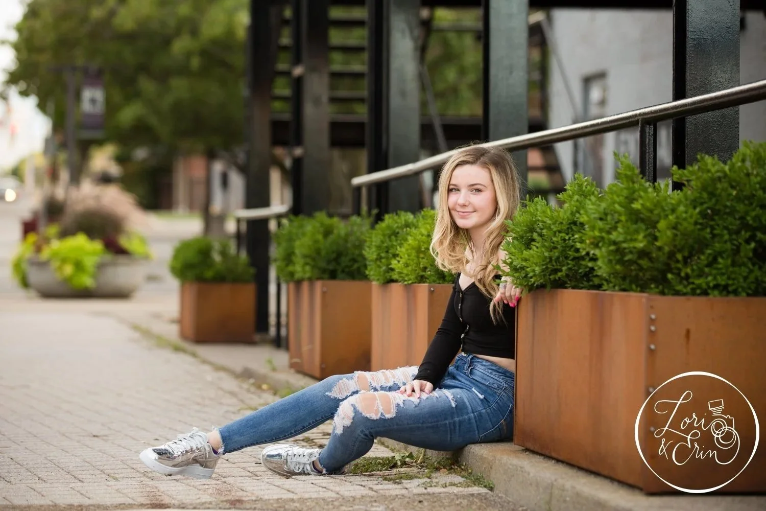 A senior portrait session of a high school girl at High Falls in Downtown Rochester NY