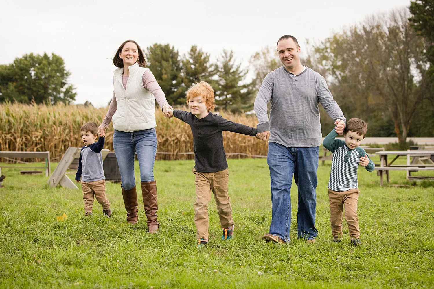 Family pictures at Long Acre Farms in Macedon NY featuring family of five walking together