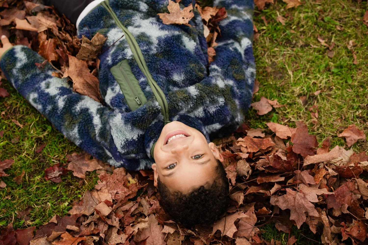 Rochester NY family photography at Tinker Park highlighting playful autumn moment