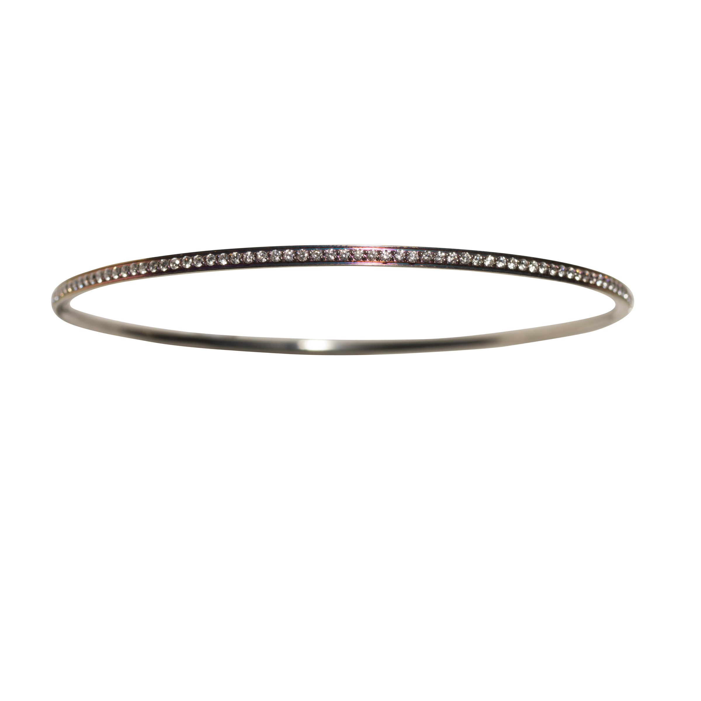 PETIT OLIVIA BRACELET 40.000 NOK Titanium and diamonds. Color of any choice