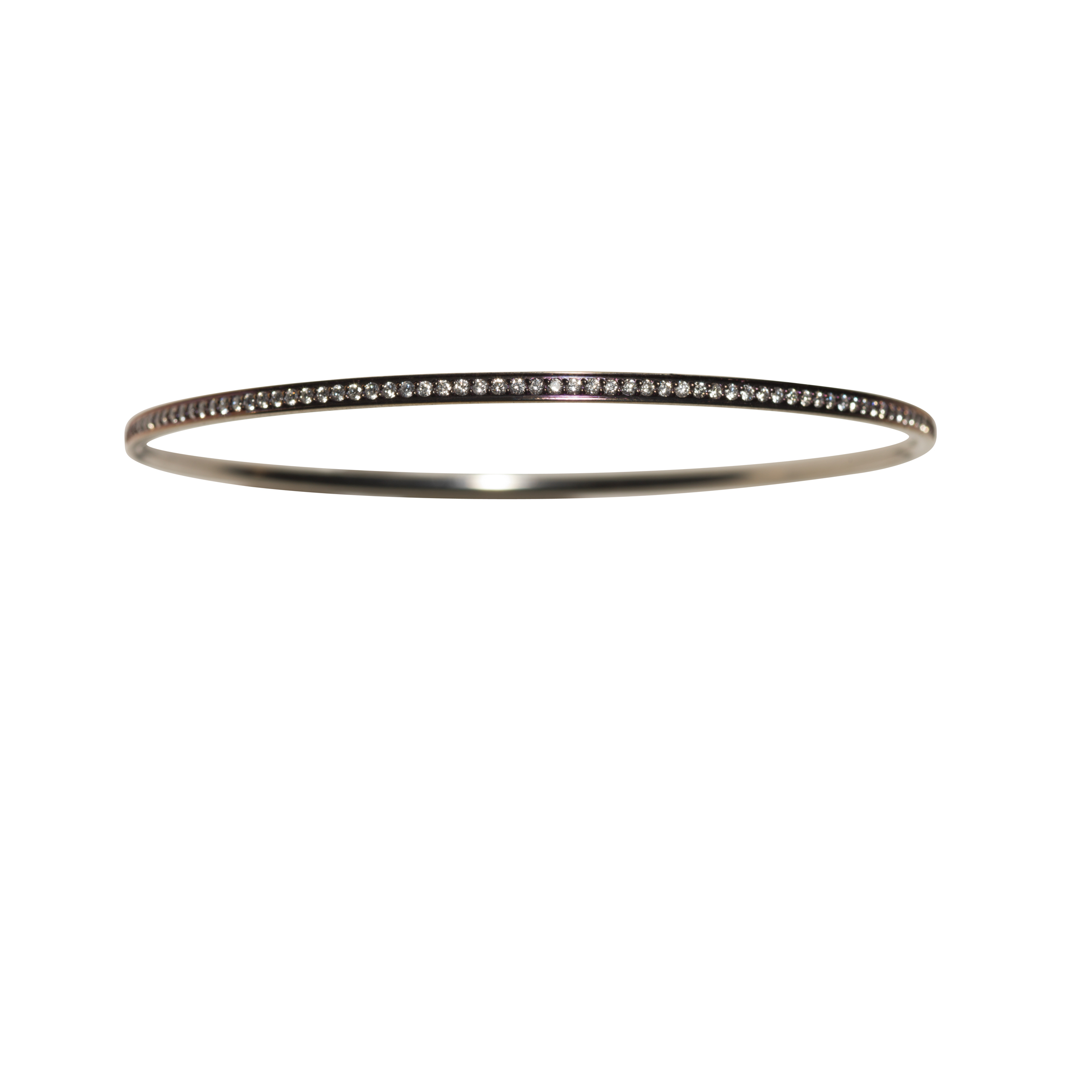 PETIT OLIVIA BRACELET 40.000 NOK Titanium and diamonds. Color of any choice