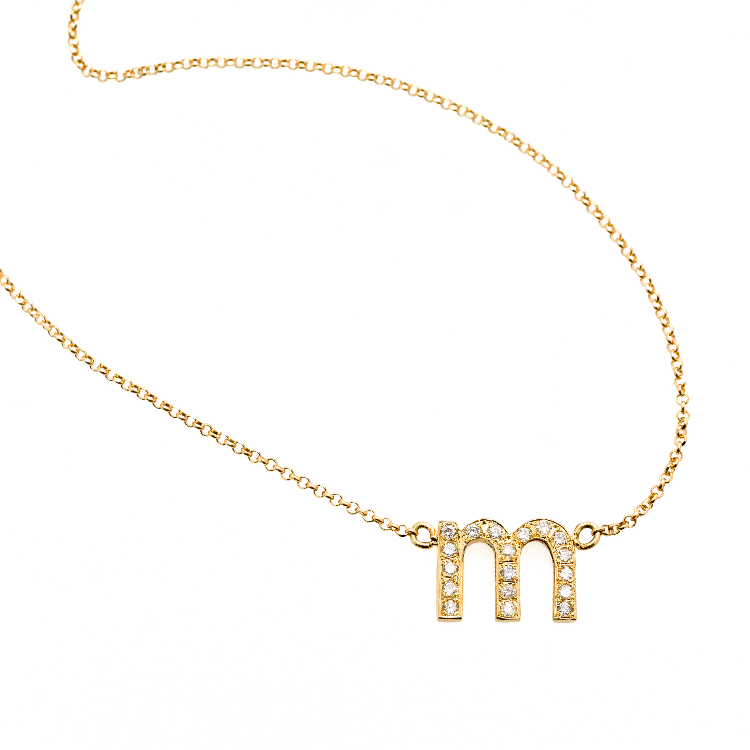 DIAMOND LETTER NECKLACE 16.000 NOK 18 kt gold with diamonds