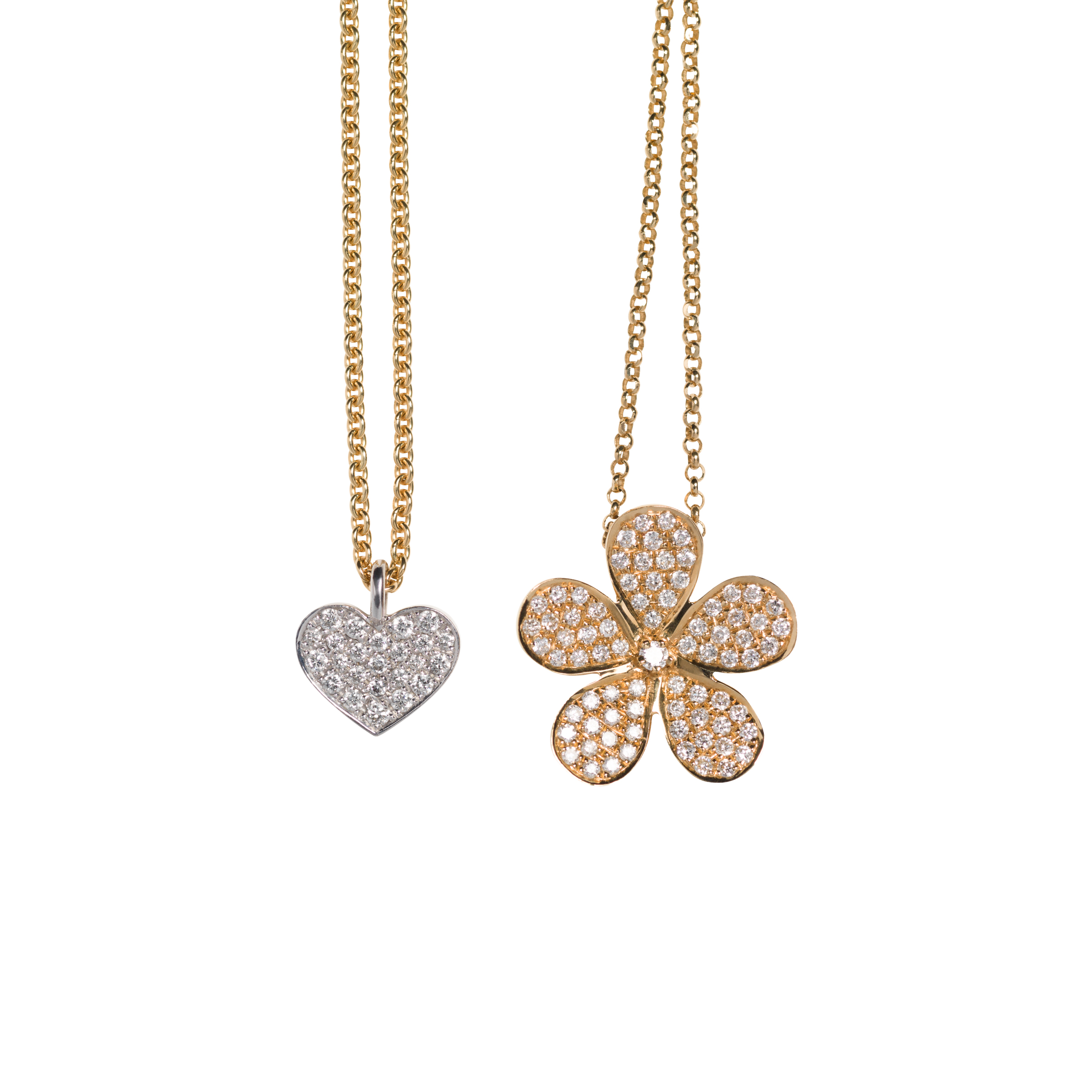 HEART NECKLACE – 10.500 NOK STELLA NECKLACE – 14.000 NOK 18 kt gold with diamonds