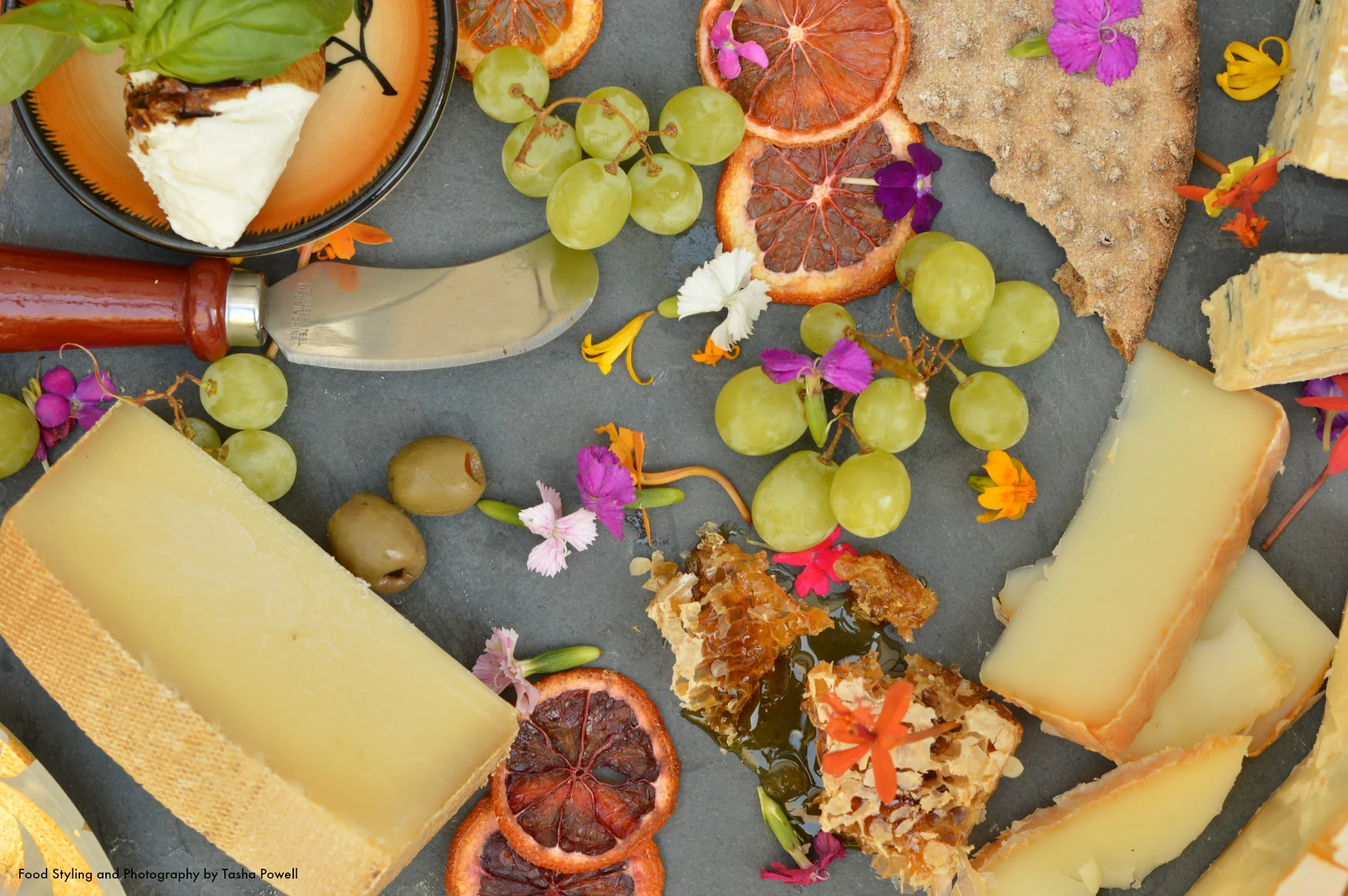 Cheese plate with flowers, honey and fruit by Tasha Powell March 2015.jpg